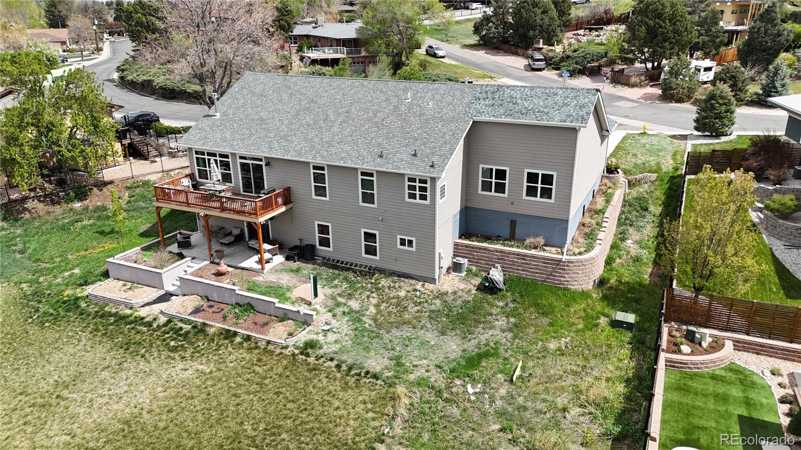6839 Estes Drive Arvada, CO 80004 - Photo 31 of 34 an aerial view of a house with a garden