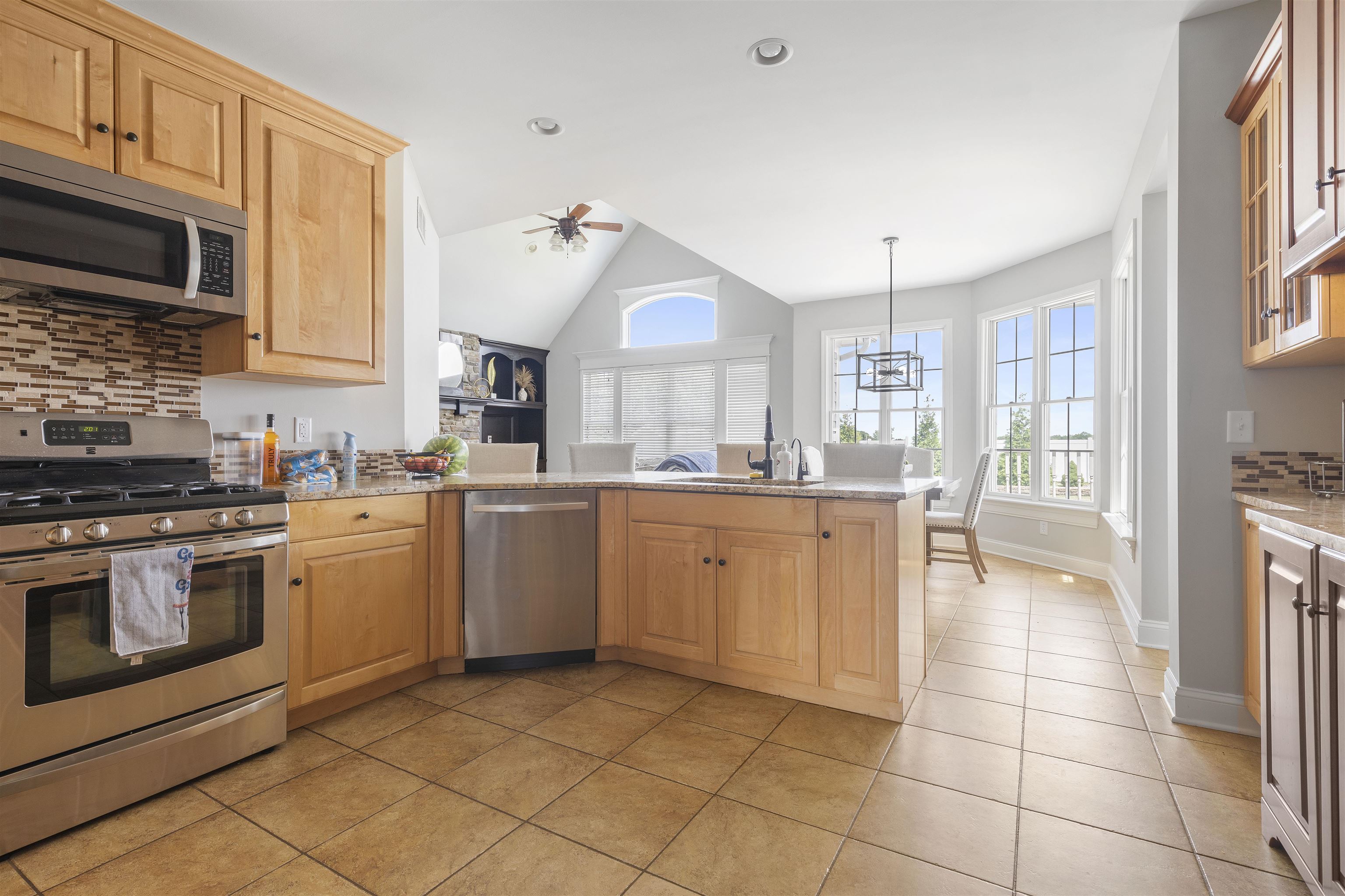 1130 Eagle Chase Drive Seneca, IL 61360 - Photo 22 of 46 a kitchen with a stove a sink and a microwave