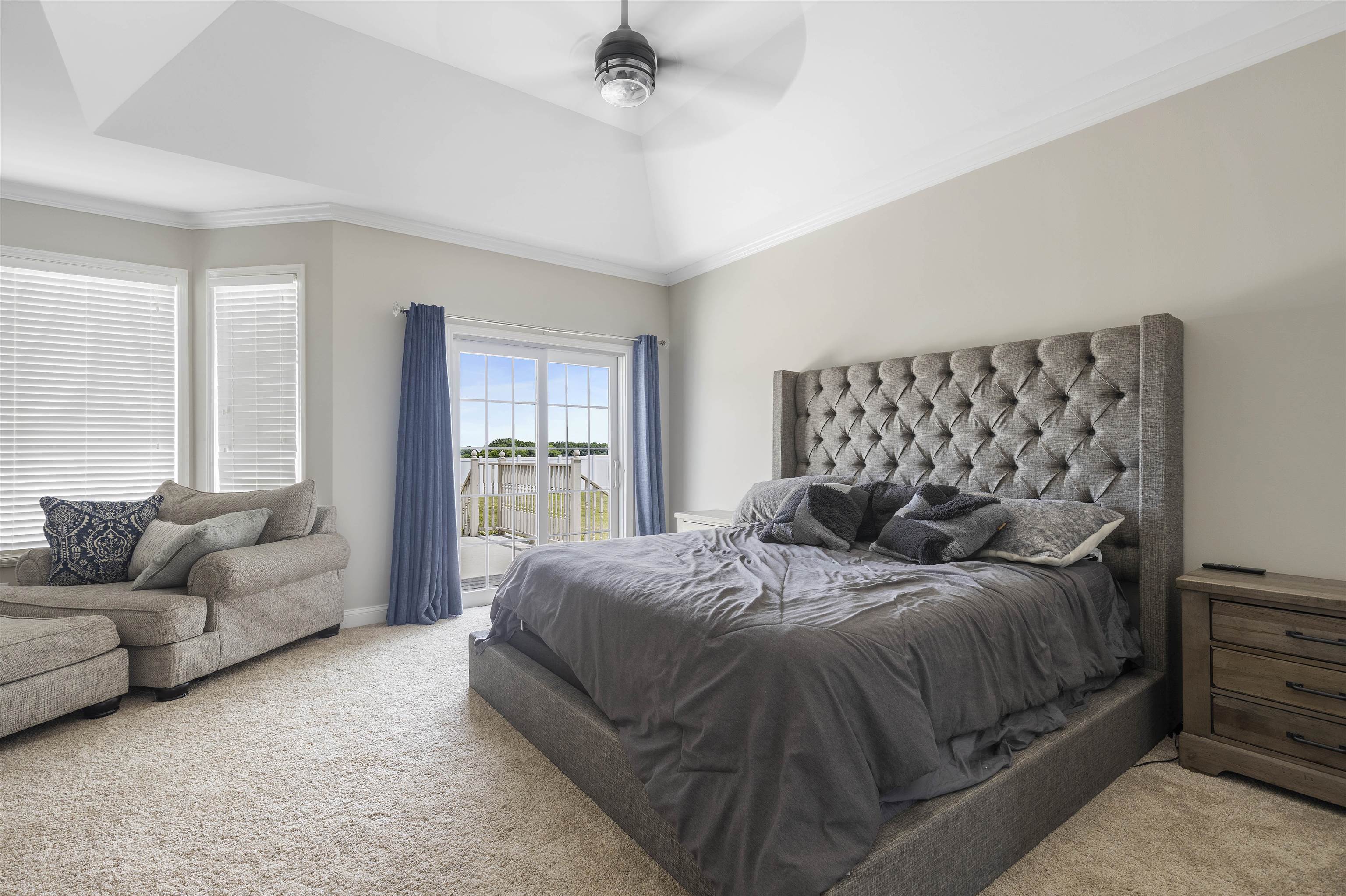 1130 Eagle Chase Drive Seneca, IL 61360 - Photo 29 of 46 a bedroom with a bed couch and a large window