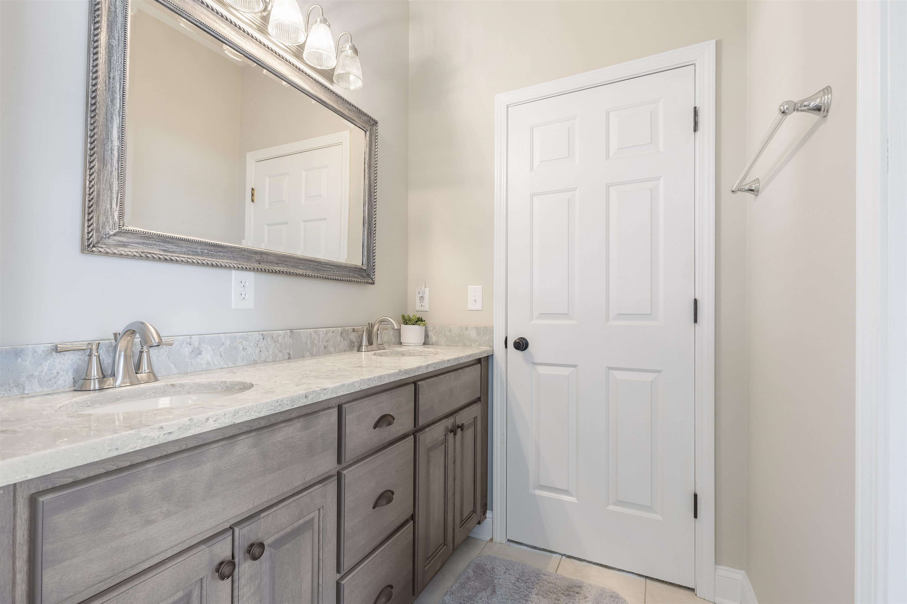 1130 Eagle Chase Drive Seneca, IL 61360 - Photo 34 of 46 a bathroom with a double vanity sink and a mirror