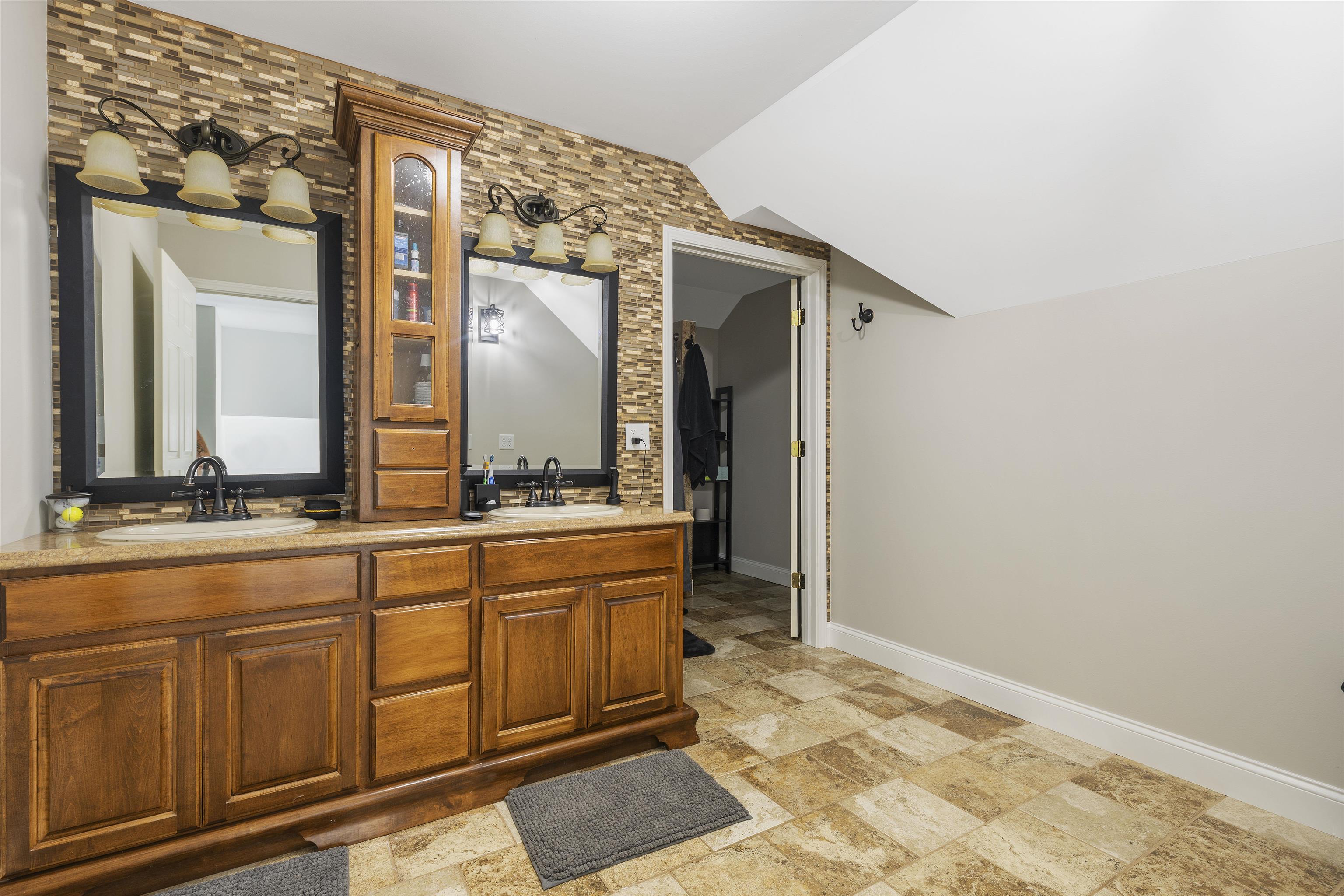 1130 Eagle Chase Drive Seneca, IL 61360 - Photo 40 of 46 a bathroom with a sink and a mirror