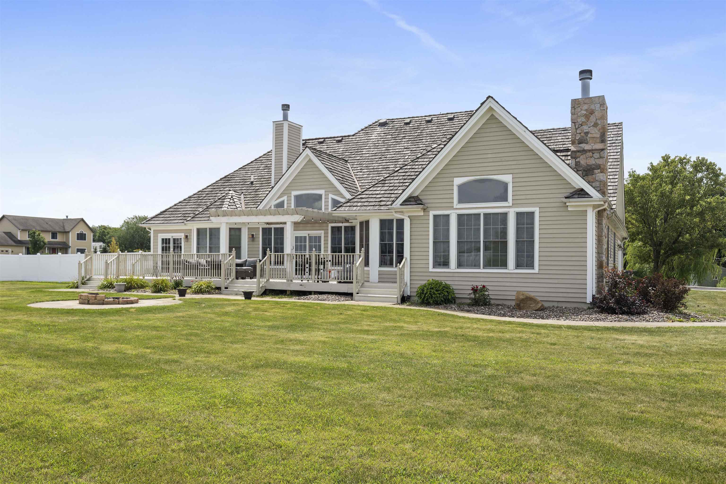 1130 Eagle Chase Drive Seneca, IL 61360 - Photo 8 of 46 a front view of a house with swimming pool having outdoor seating