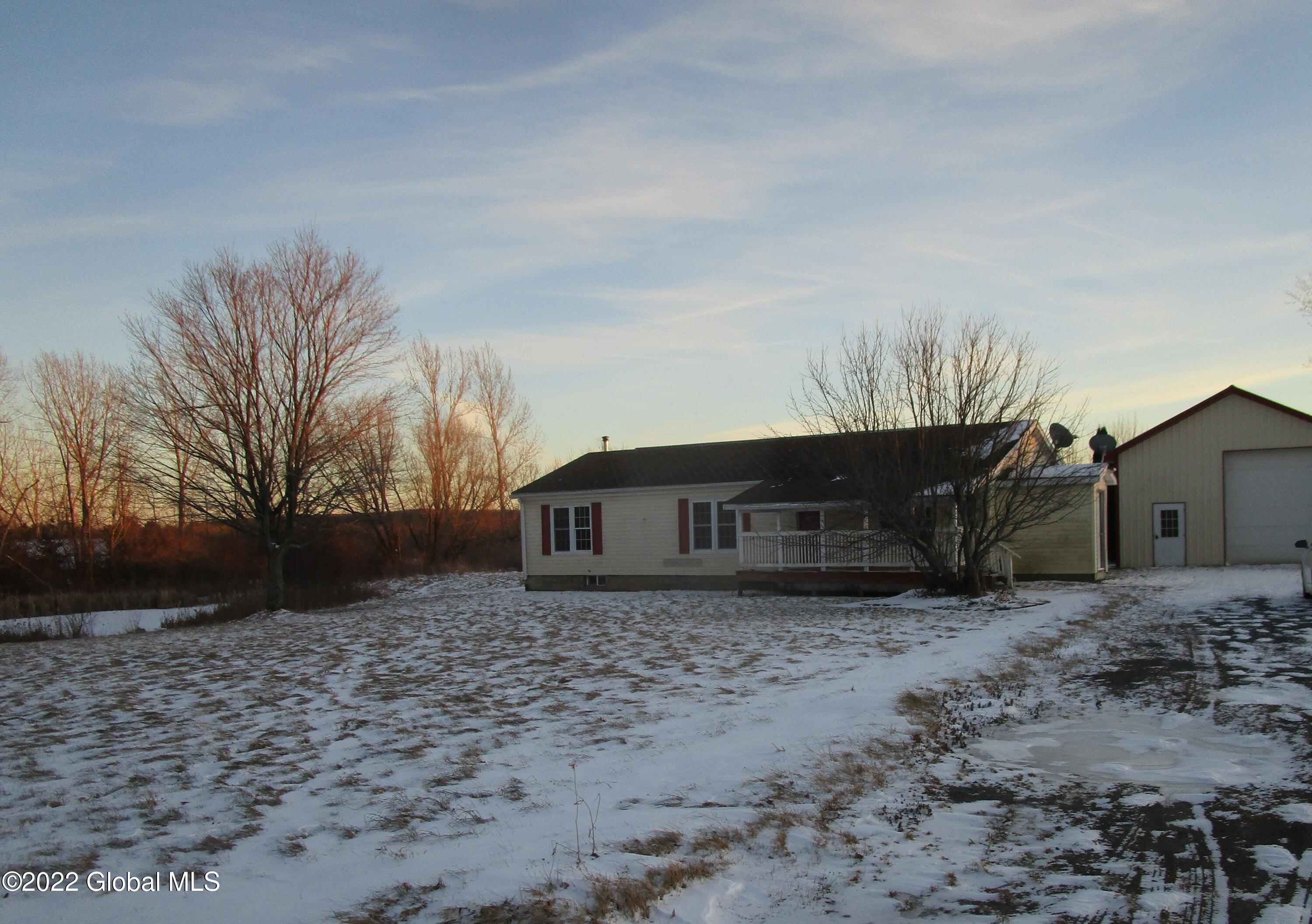 95 Church Road Delanson, NY 12053 - Photo 24 of 25 church front garage pond