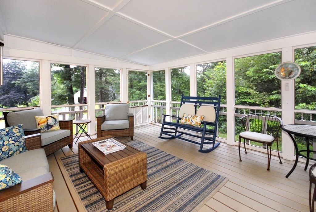 379 Stow Road Boxborough, MA 01719 - Photo 23 of 26 a living room with furniture and a floor to ceiling window