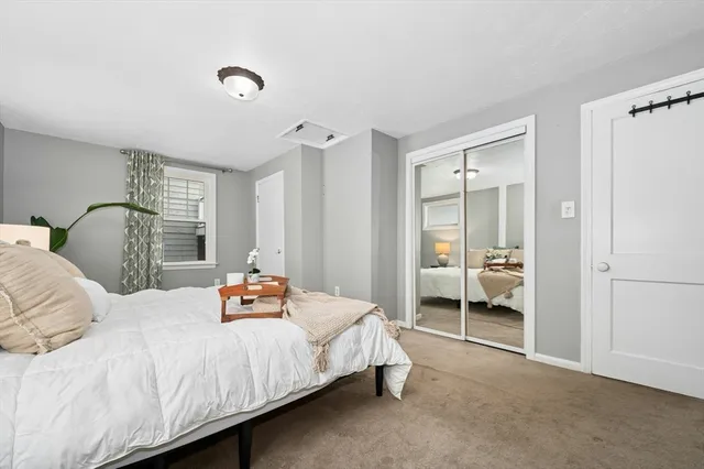 a view of empty room with furniture