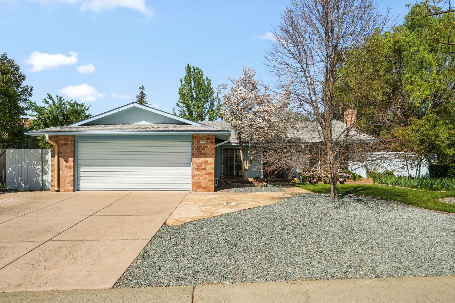 9699 Rudway Court Sacramento, CA 95827 - Photo 1 of 1 a front view of a house with garden