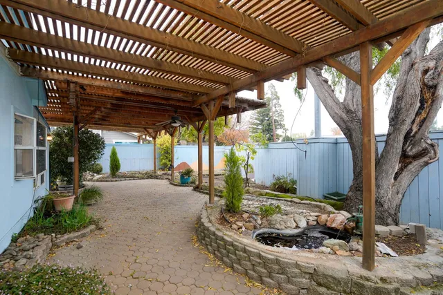a view of a porch with furniture