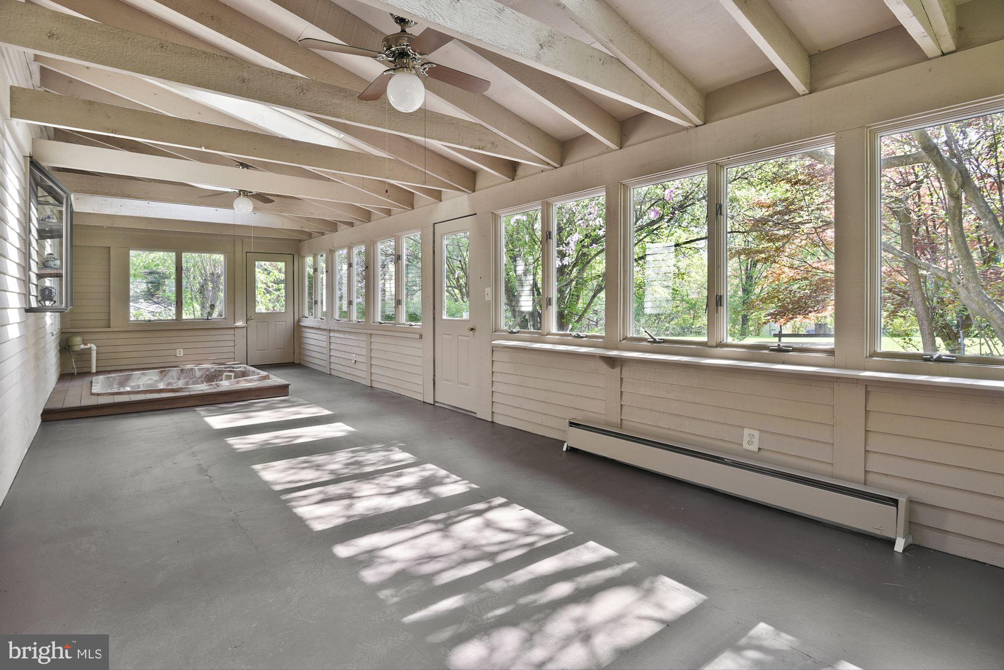 4703 Wards Chapel Road Owings Mills, MD 21117 - Photo 19 of 42 Huge screened in porch off family room