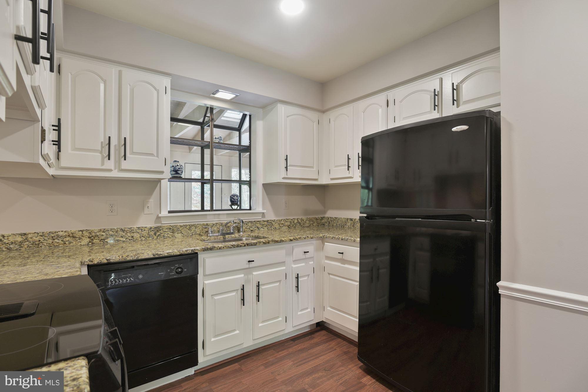 4703 Wards Chapel Road Owings Mills, MD 21117 - Photo 9 of 42 Granite counters and a garden window