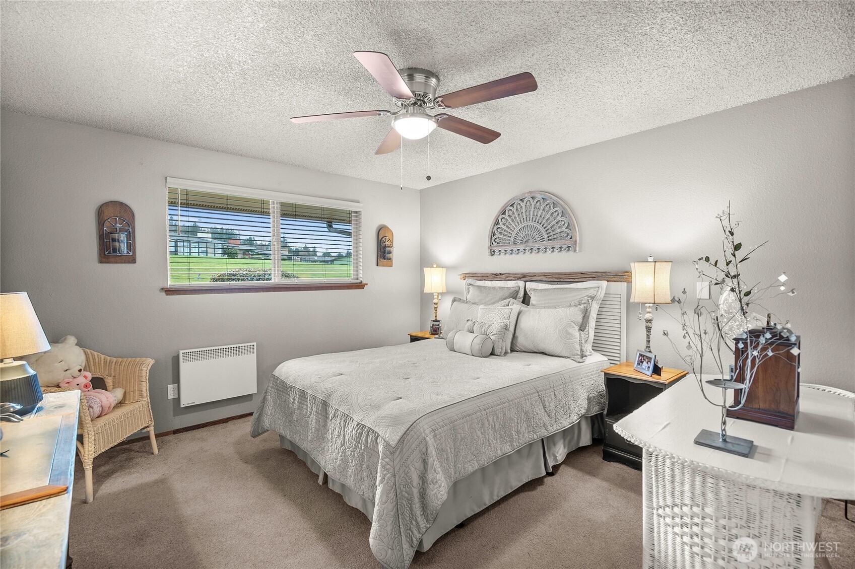 1301 South 3rd Avenue, Unit 15D Sequim, WA 98382 - Photo 15 of 26 a bedroom with a bed and window