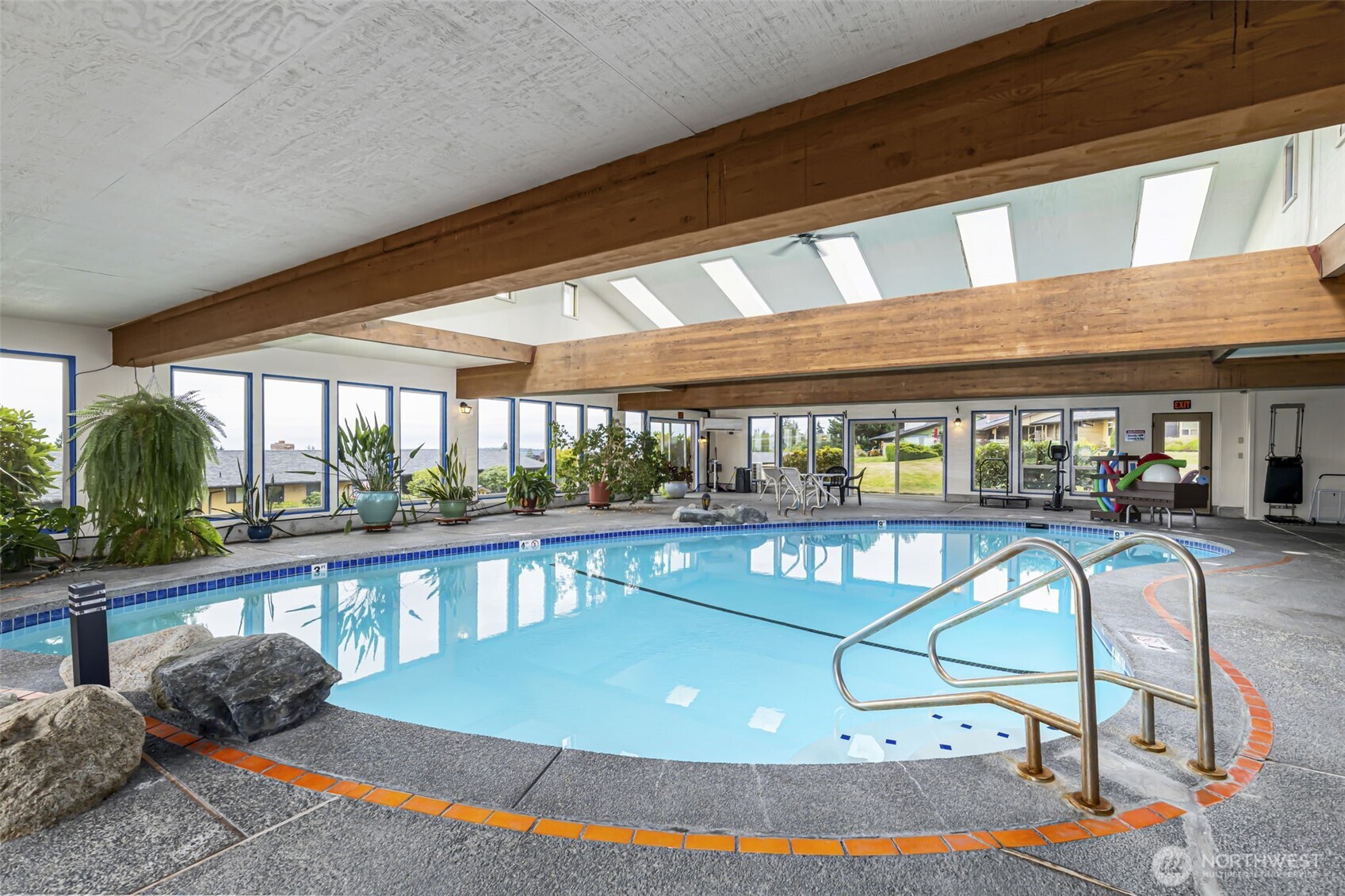 1301 South 3rd Avenue, Unit 15D Sequim, WA 98382 - Photo 24 of 26 a view of swimming pool with seating space