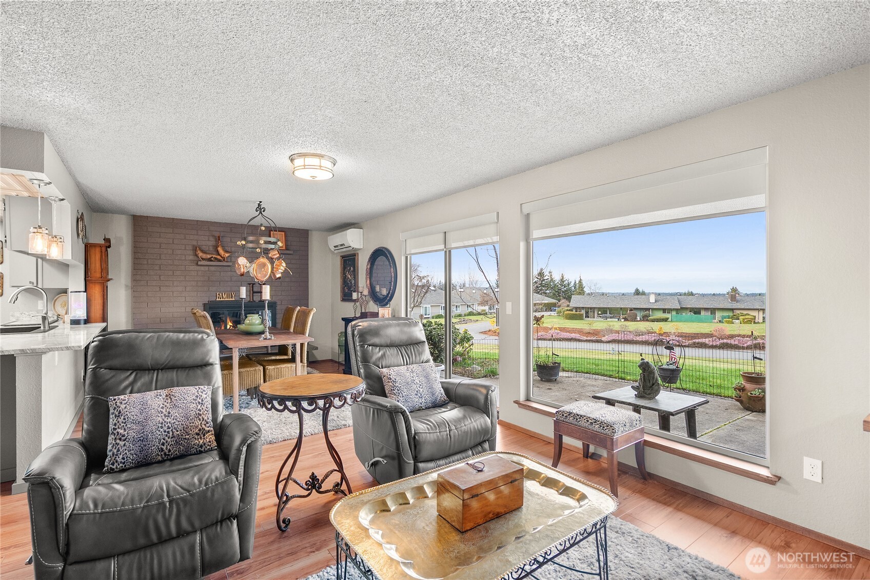 1301 South 3rd Avenue, Unit 15D Sequim, WA 98382 - Photo 8 of 26 a living room with furniture and a large window