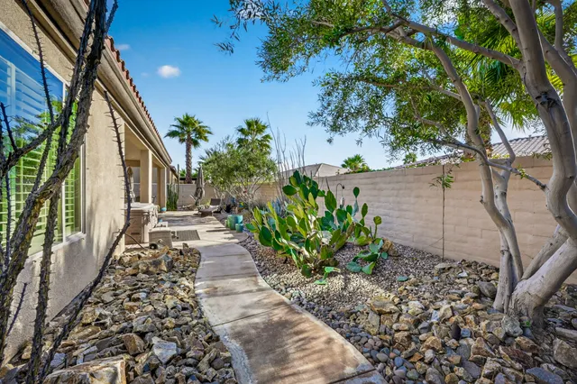 a house view with a garden space