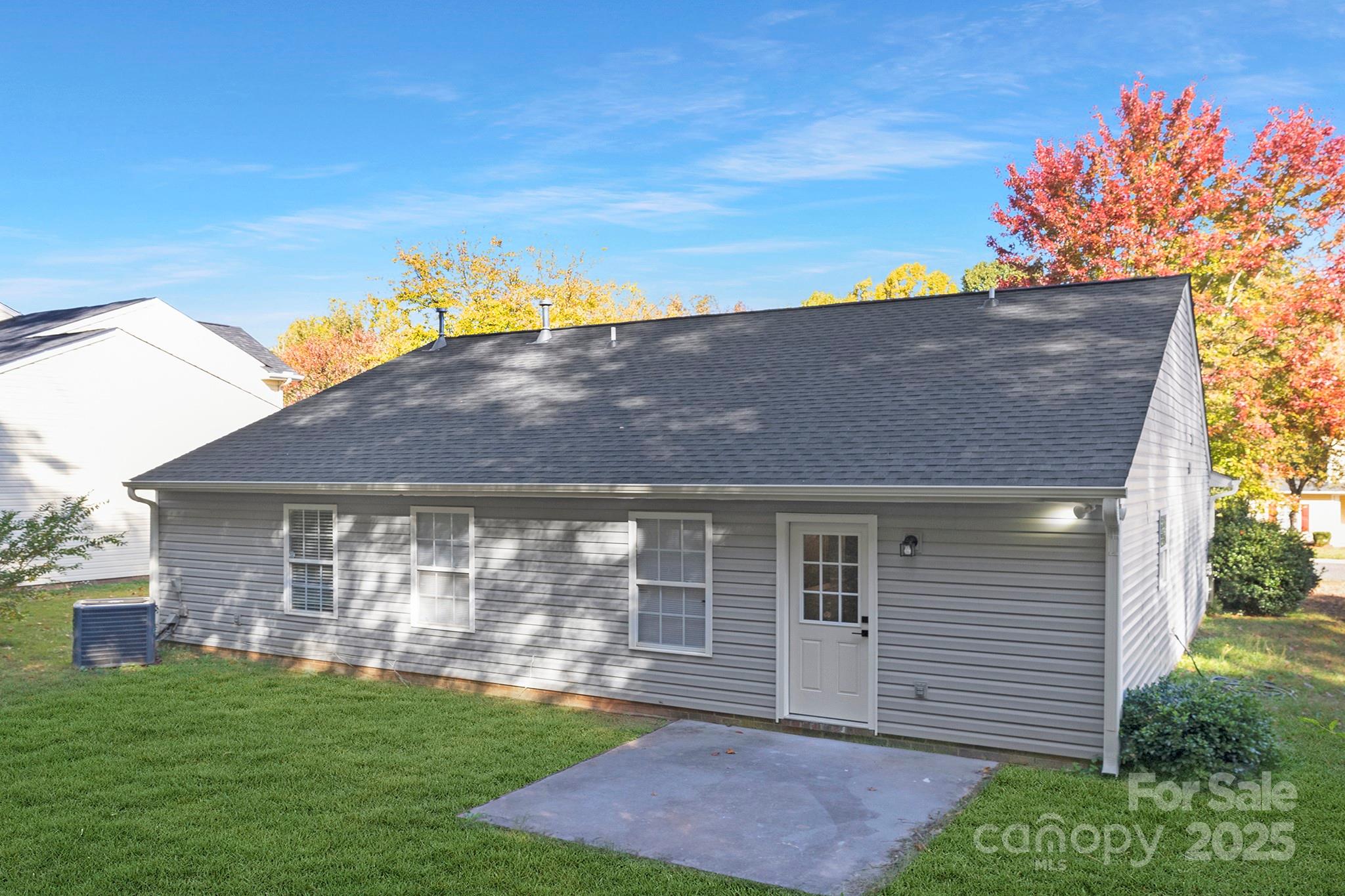 2012 Pheasant Glen Road Charlotte, NC 28214 - Photo 18 of 20 a front view of a house with a garden