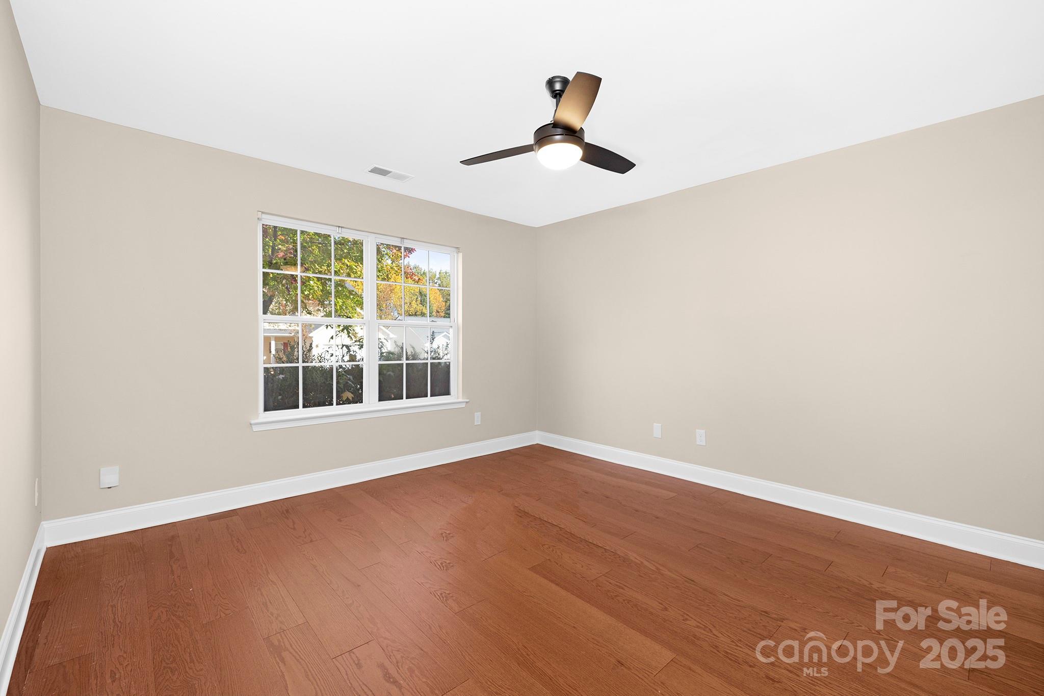 2012 Pheasant Glen Road Charlotte, NC 28214 - Photo 7 of 20 a view of an empty room with a window