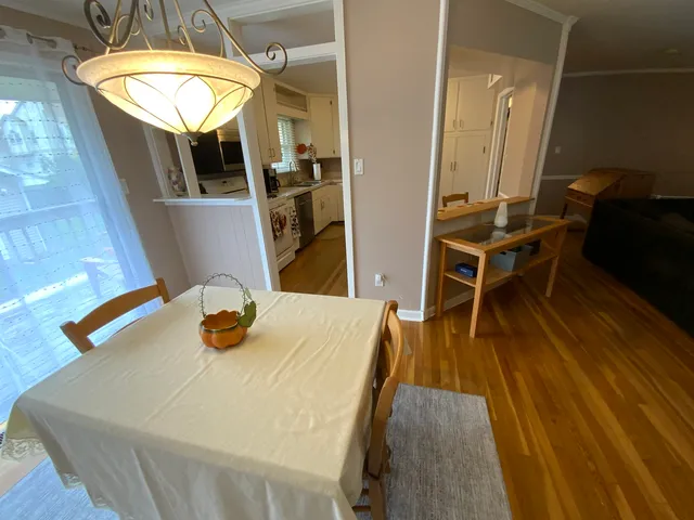 a dining room with wooden floor