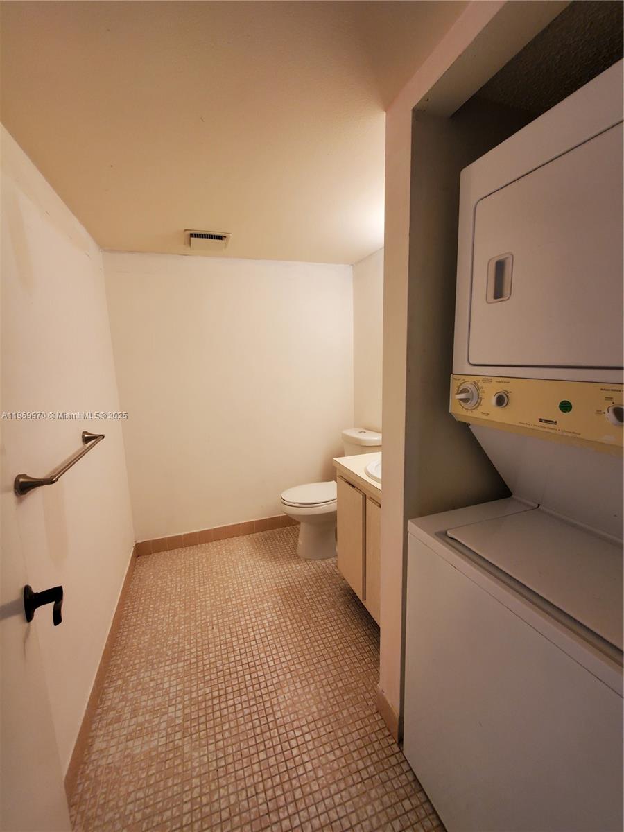 5550 Northwest 44th Street, Unit 111B Lauderhill, FL 33319 - Photo 16 of 22 a bathroom with a toilet and a shower