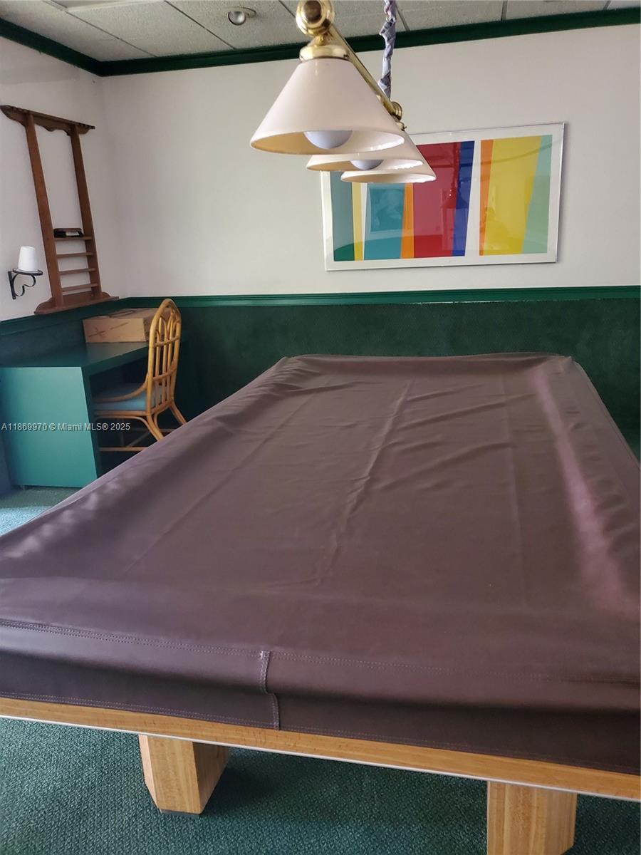 5550 Northwest 44th Street, Unit 111B Lauderhill, FL 33319 - Photo 18 of 22 a front view of a house with garden