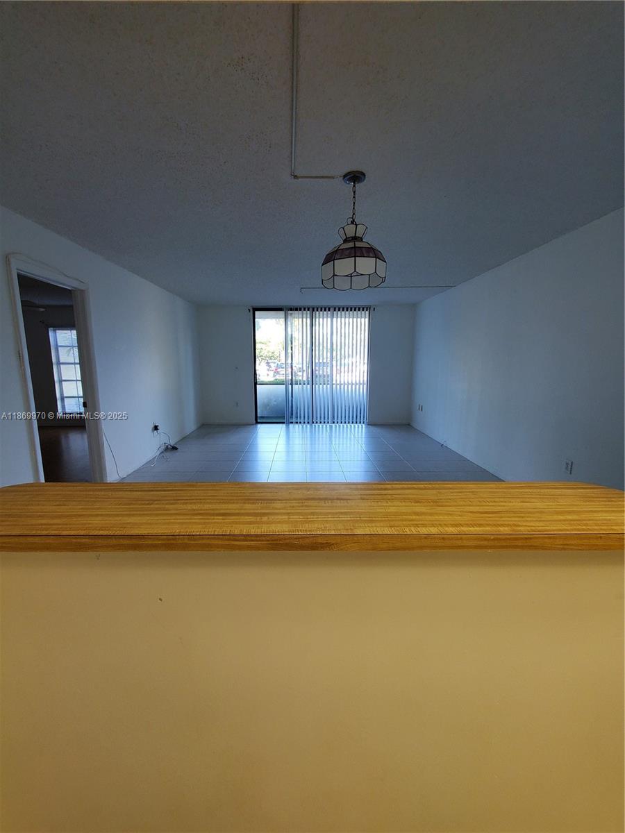 5550 Northwest 44th Street, Unit 111B Lauderhill, FL 33319 - Photo 7 of 22 a view of a room with window