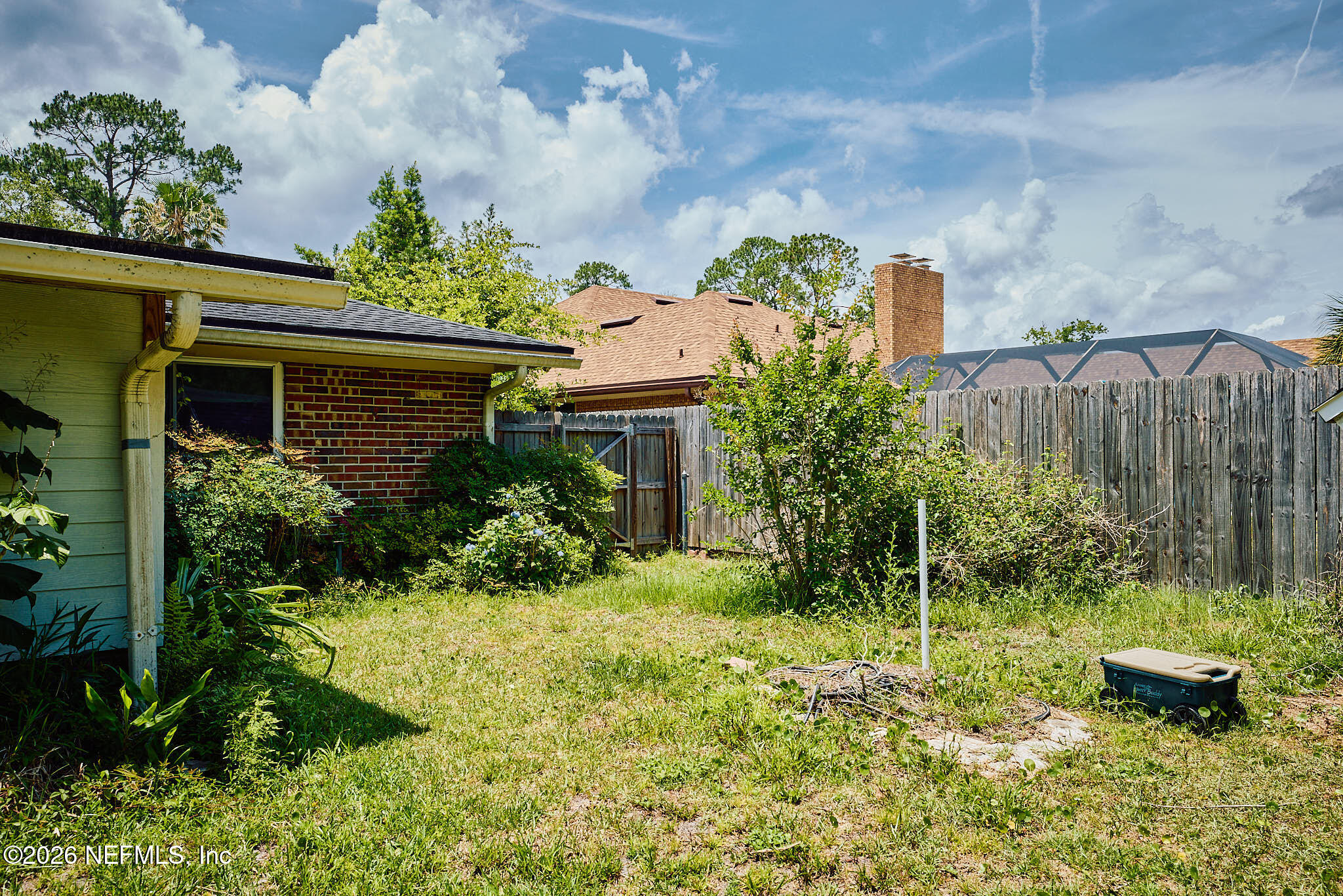 8965 San Rae Road Jacksonville, FL 32257 - Photo 30 of 46 a view of a house with a yard and plants