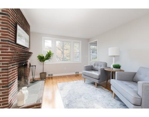 12 Simpson Road Wayland, MA 01778 - Photo 13 of 30 a living room with furniture and a fireplace