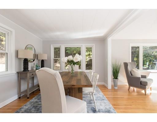12 Simpson Road Wayland, MA 01778 - Photo 9 of 30 a dining room with furniture a potted plant and wooden floor