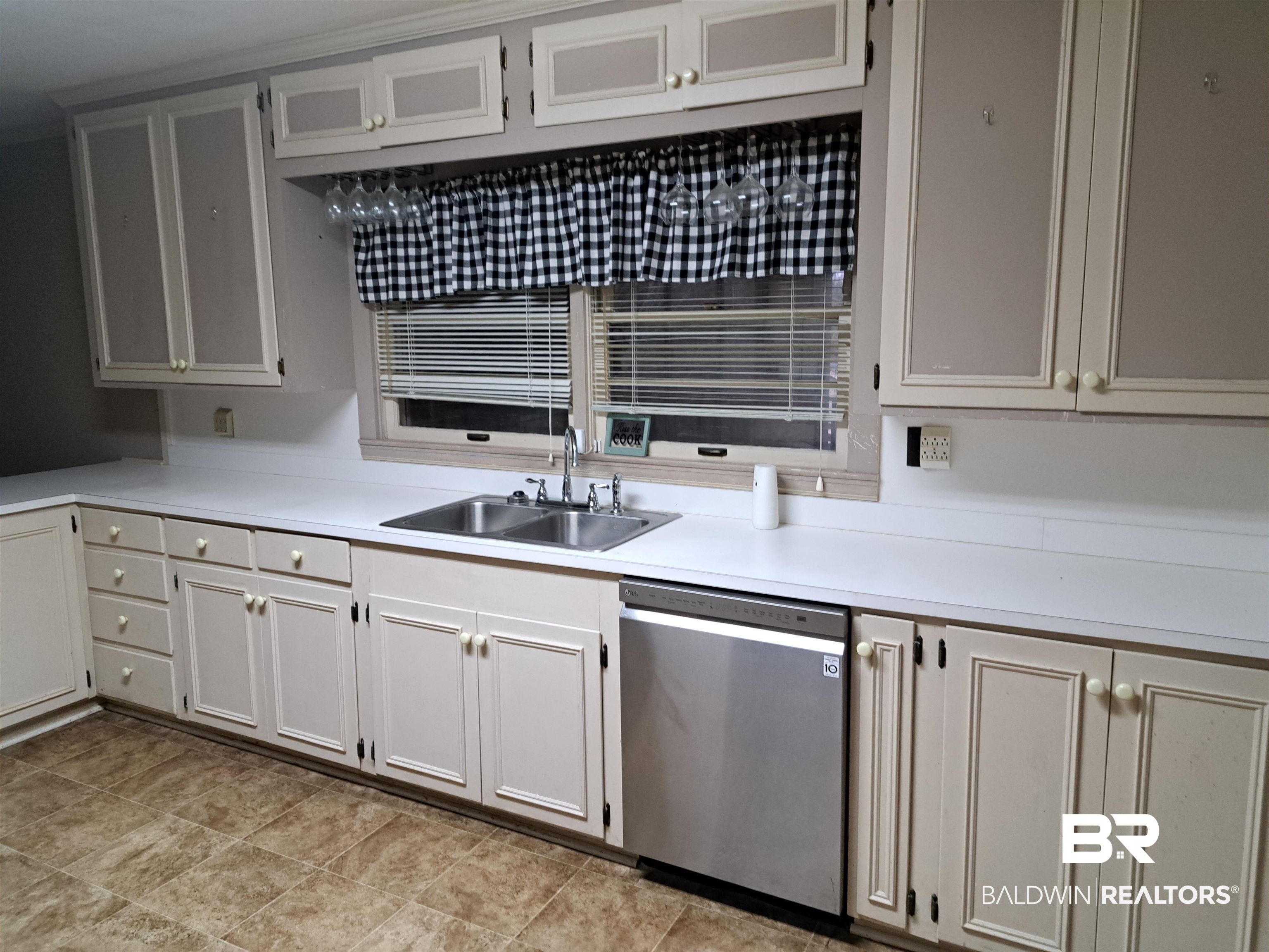 249 Newton Parkway Evergreen, AL 36401 - Photo 5 of 28 Kitchen featuring light countertops and dishwasher