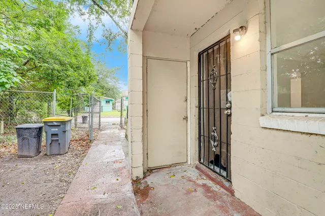 a view of backyard with green space