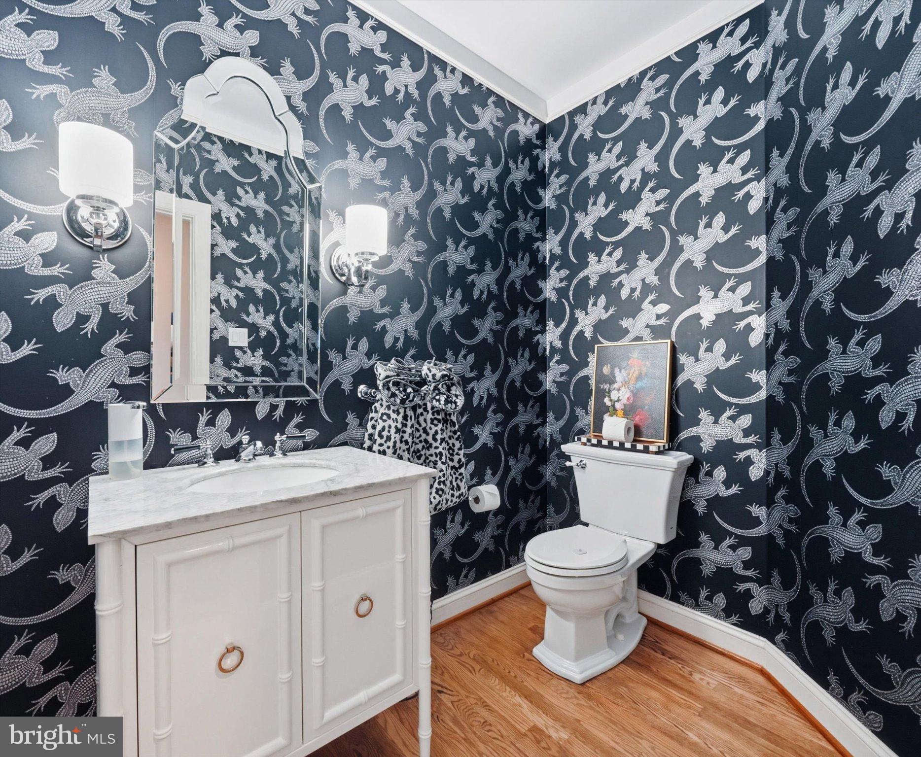 1540 Fairville Road Chadds Ford, PA 19317 - Photo 30 of 84 Elegant half-bath with bold wallpaper.