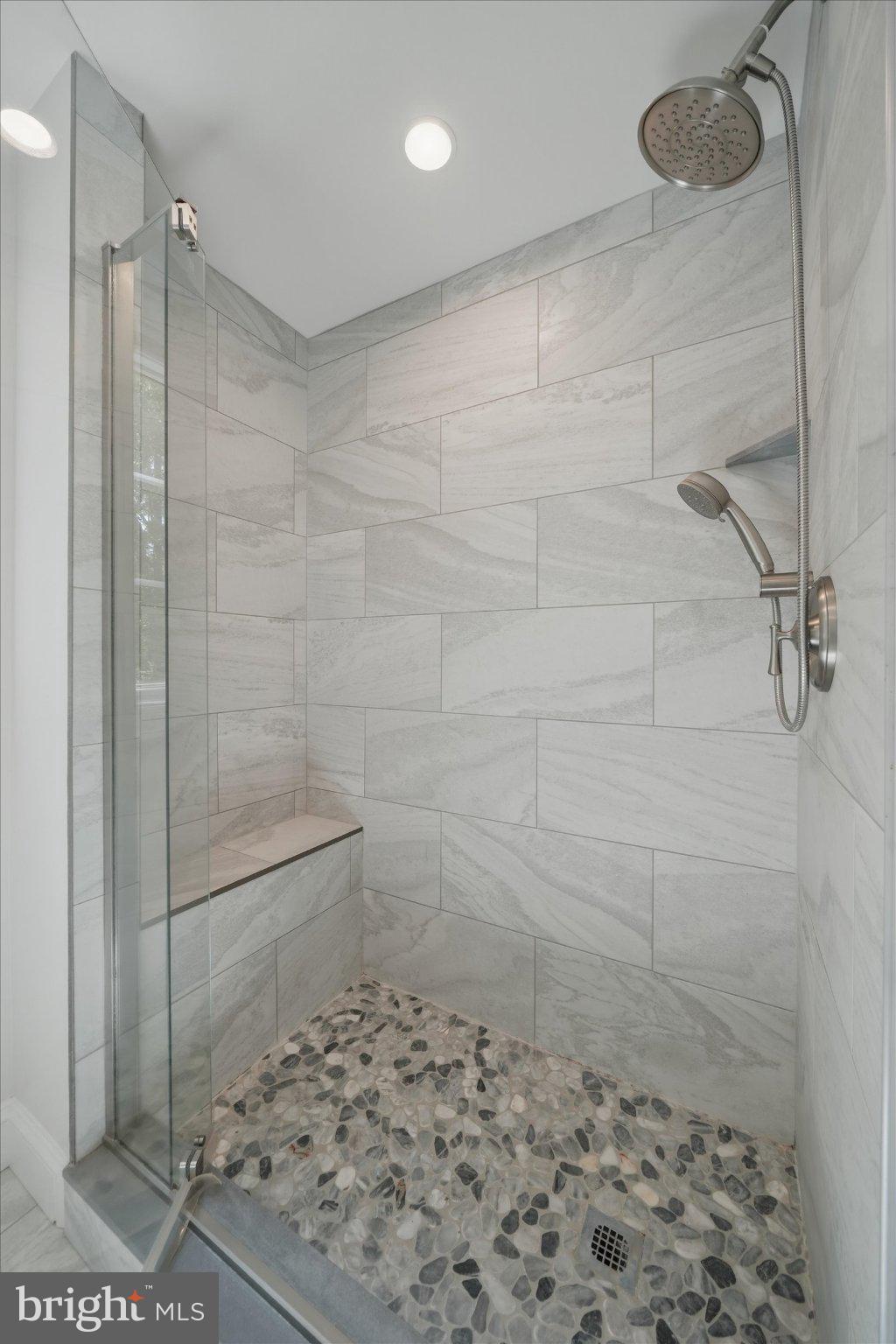 1540 Fairville Road Chadds Ford, PA 19317 - Photo 55 of 84 Sleek modern shower with elegant tiles.