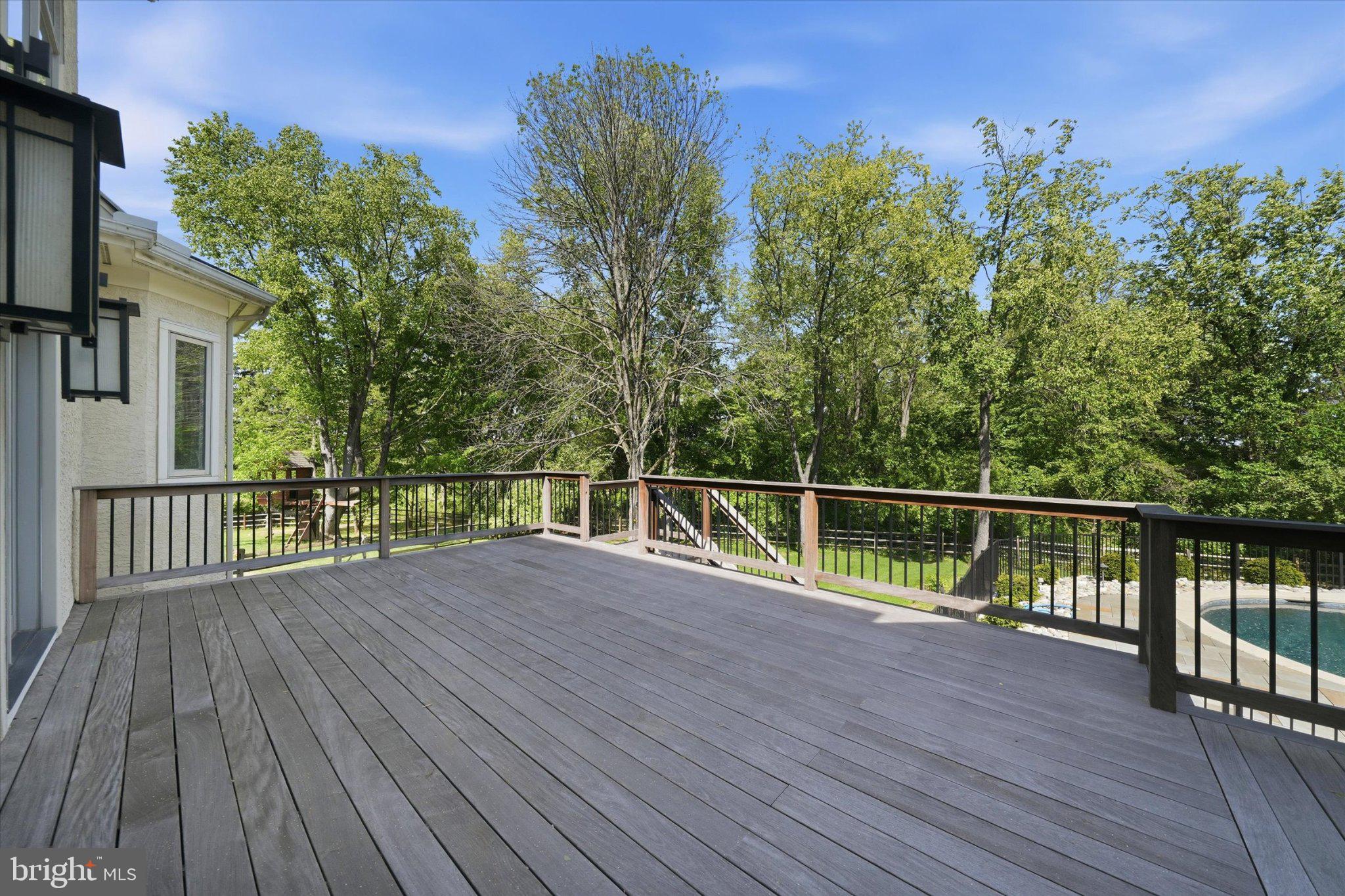 1540 Fairville Road Chadds Ford, PA 19317 - Photo 68 of 84 Spacious deck with serene greenery.
