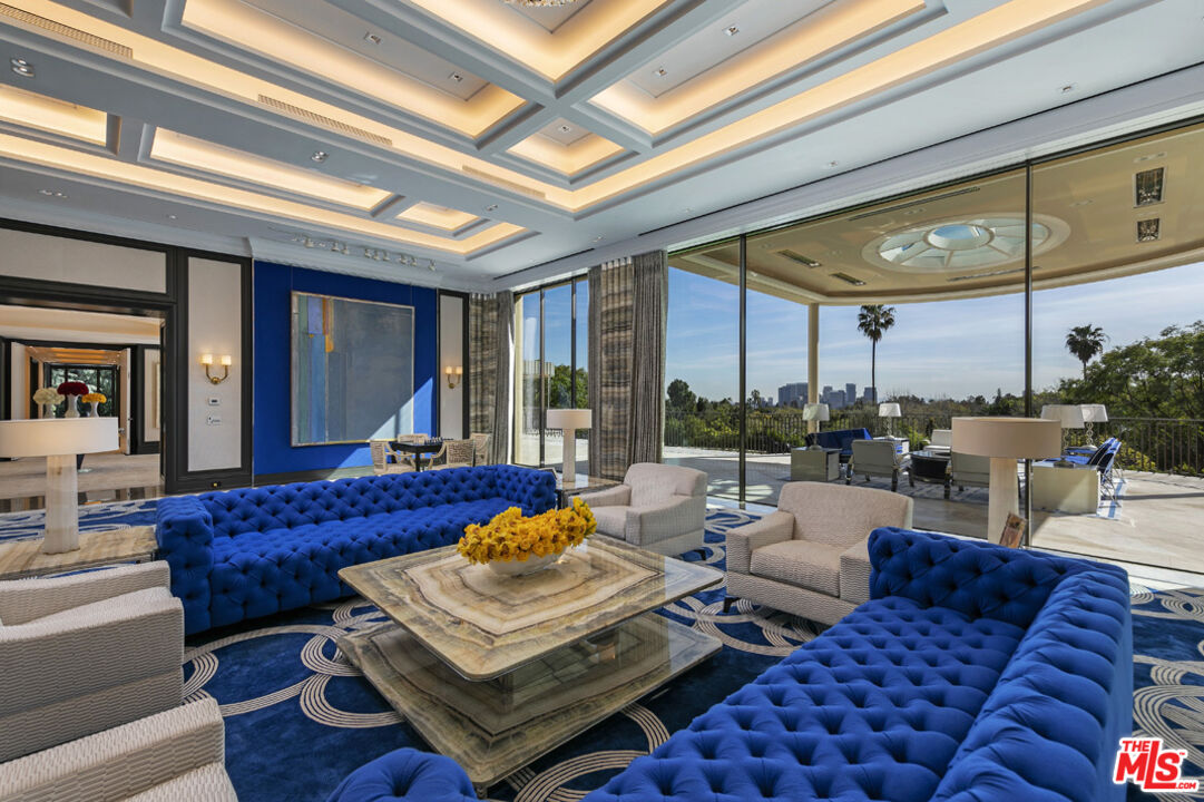 Undisclosed Address Beverly Hills, CA 90210 - Photo 7 of 14 a living room with furniture and a large window