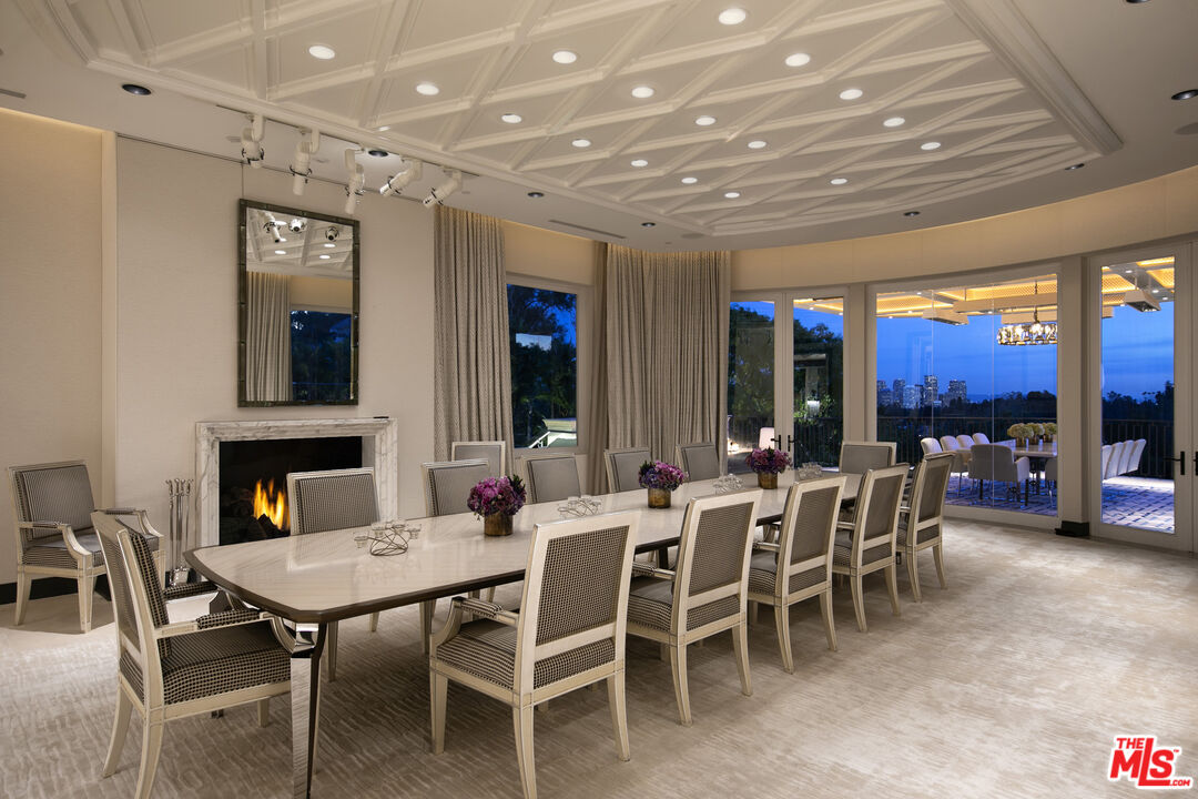 Undisclosed Address Beverly Hills, CA 90210 - Photo 8 of 14 a view of a dining room with furniture window and outside view