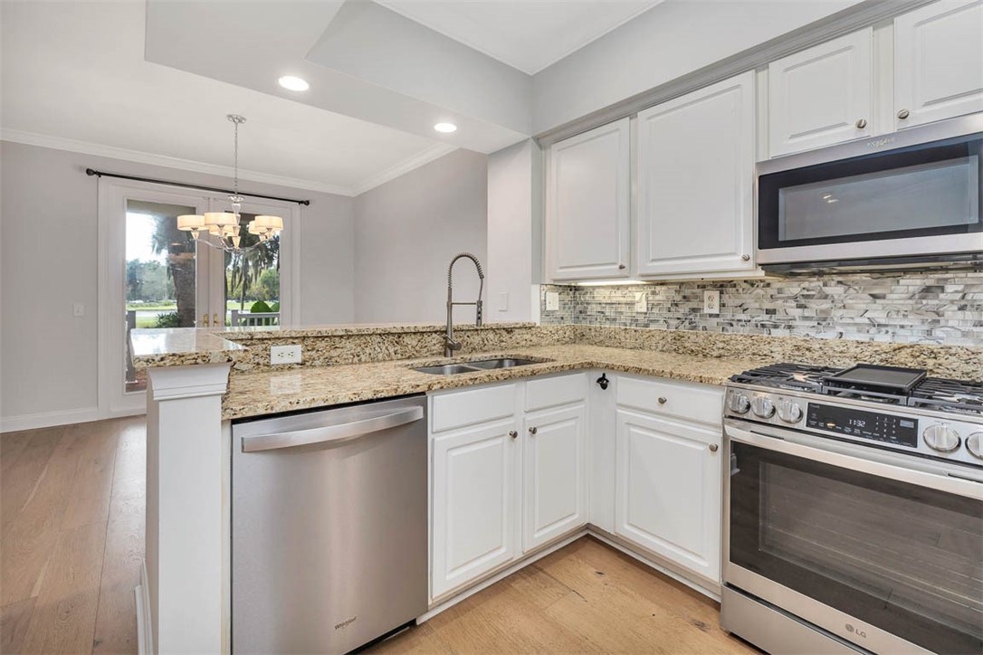 119 Kiln Trail St. Simons Island, GA 31522 - Photo 7 of 23 Kitchen, Dining to Patio Doors