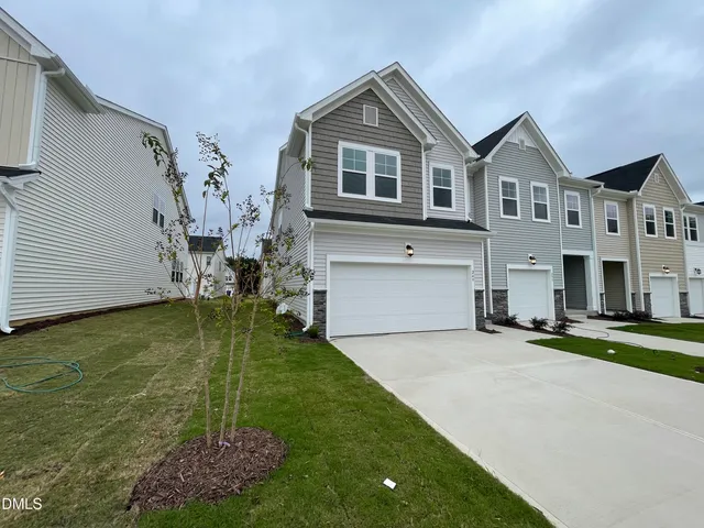 a big house with a big yard and more windows
