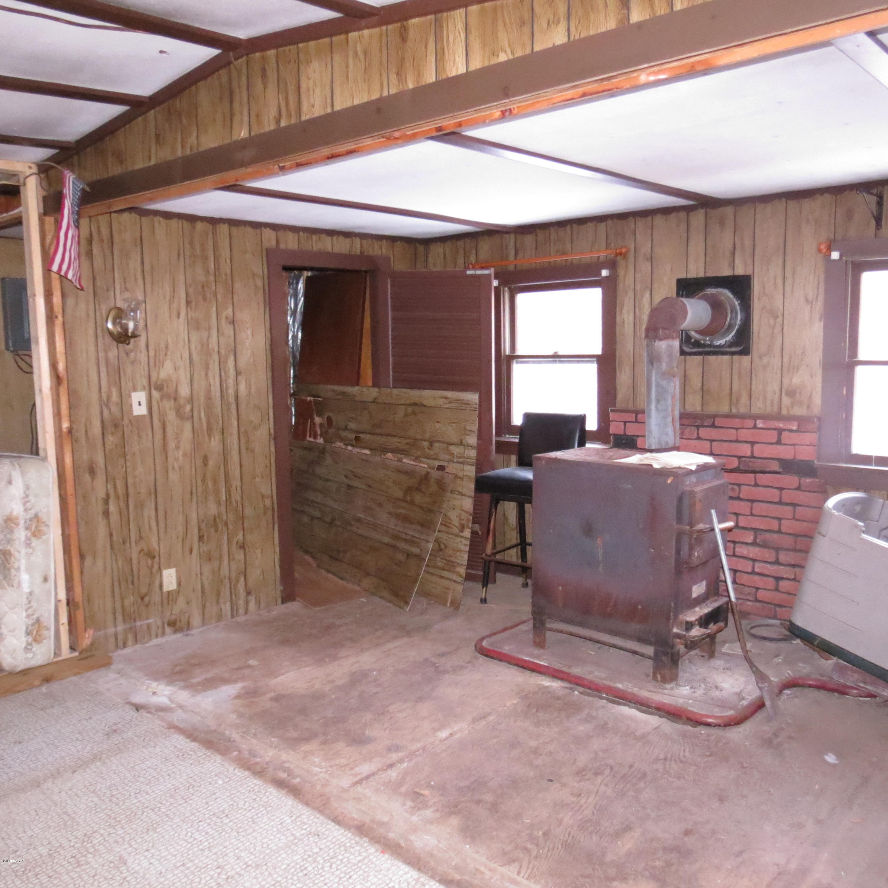 805 Lincoln Road Stamford, VT 05352 - Photo 12 of 13 a room with furniture and window