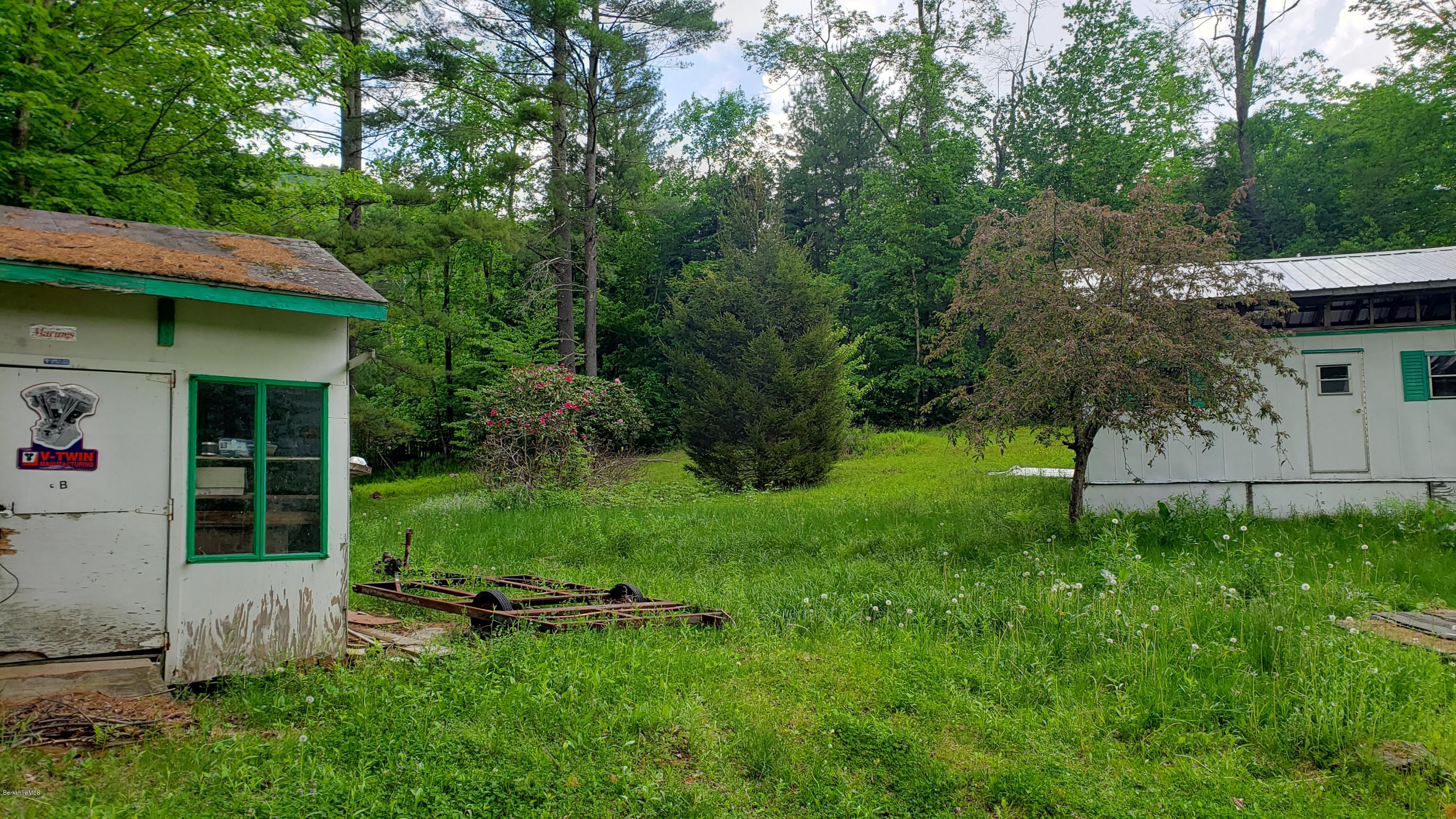 805 Lincoln Road Stamford, VT 05352 - Photo 4 of 13 a view of a house with backyard