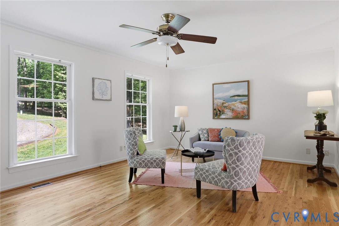 6714 Belmont Road Chesterfield, VA 23832 - Photo 15 of 52 Newly refinished hardwoods flow from living area i