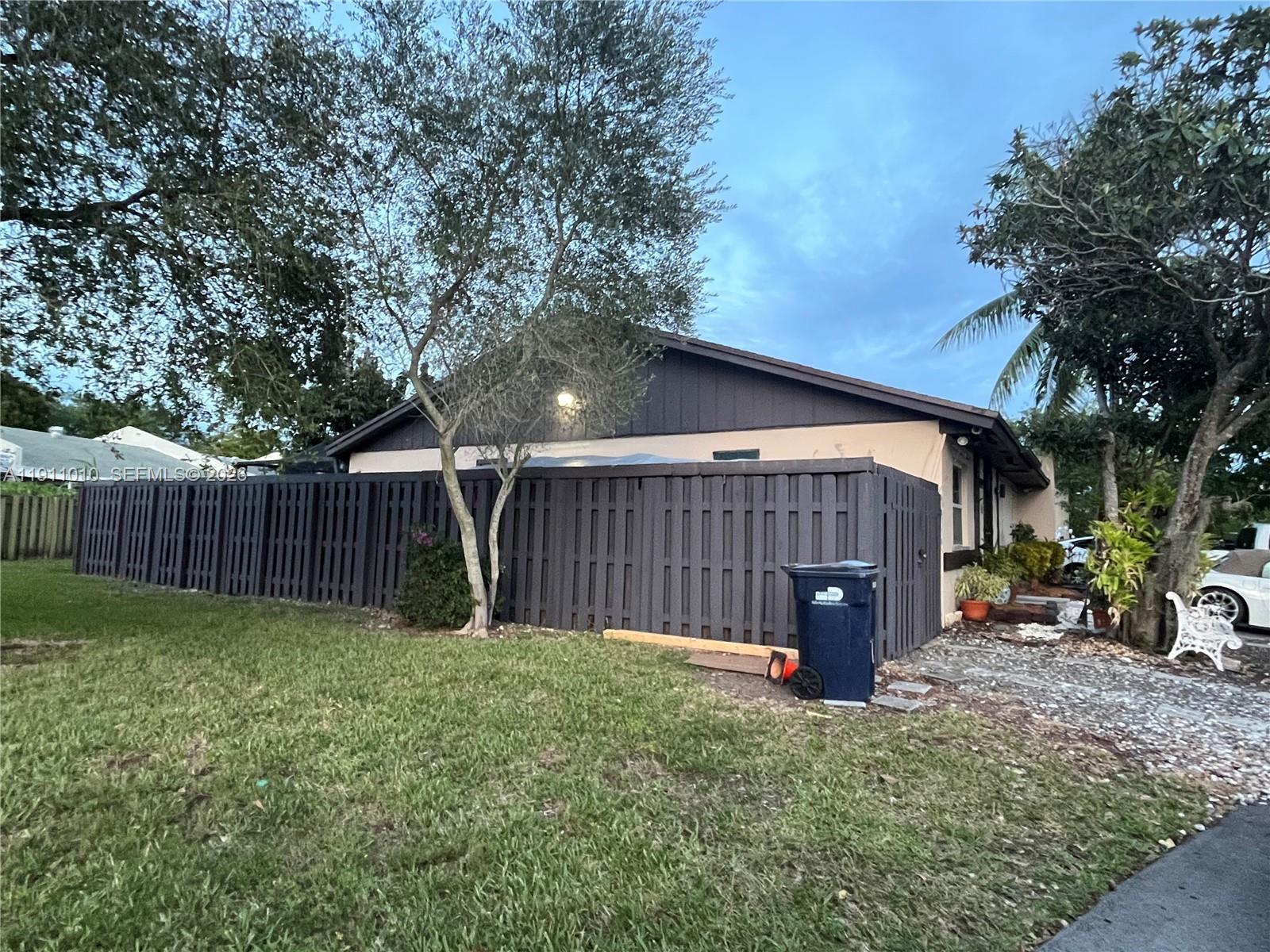 12215 Southwest 119th Terrace Miami, FL 33186 - Photo 16 of 17 a view of backyard with green space