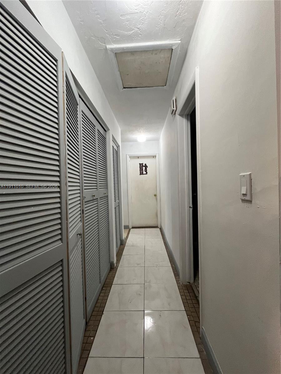 12215 Southwest 119th Terrace Miami, FL 33186 - Photo 10 of 17 a view of a hallway