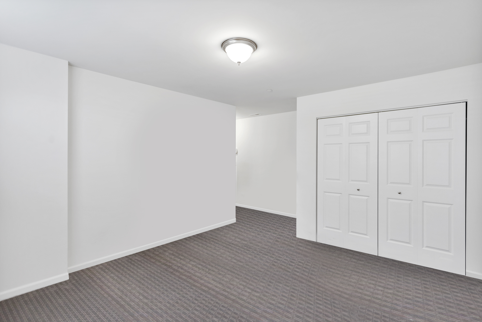 2967 Madison Drive Naperville, IL 60564 - Photo 22 of 24 a view of an empty room with wooden floor and a window