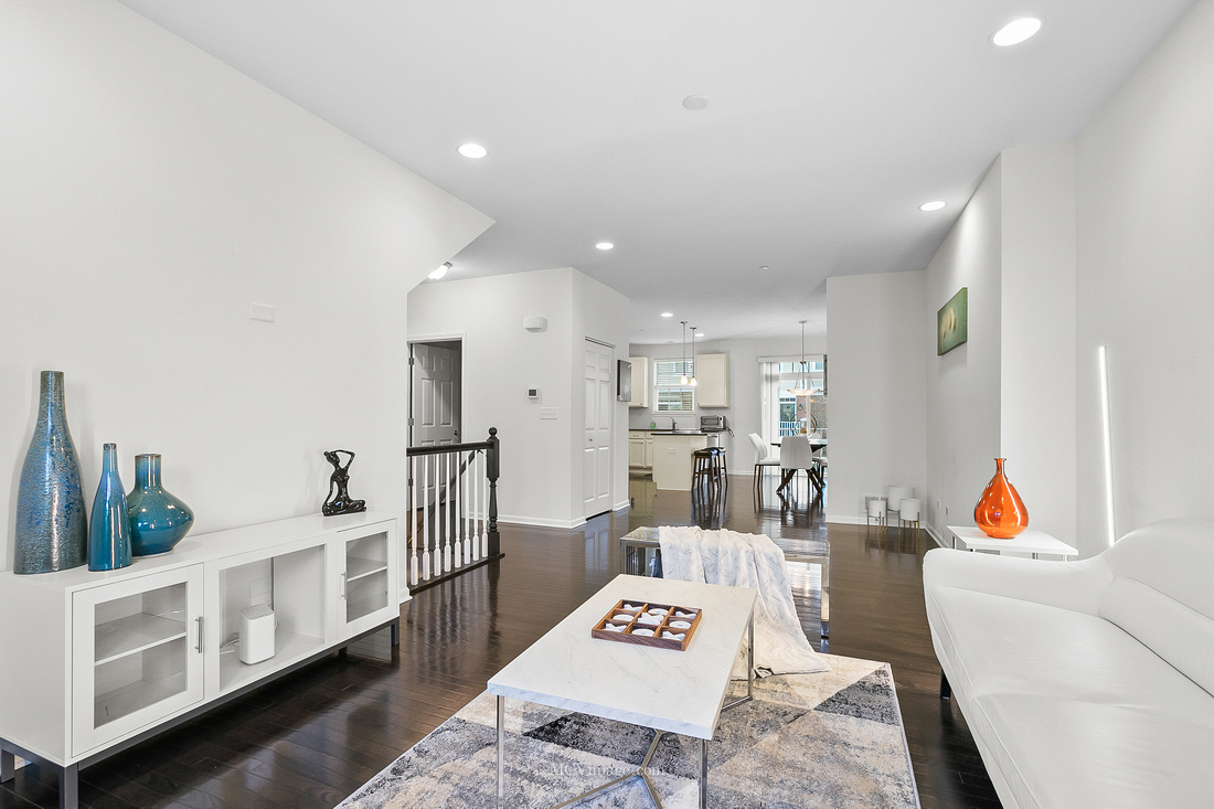2967 Madison Drive Naperville, IL 60564 - Photo 5 of 24 a living room with furniture and a wooden floor