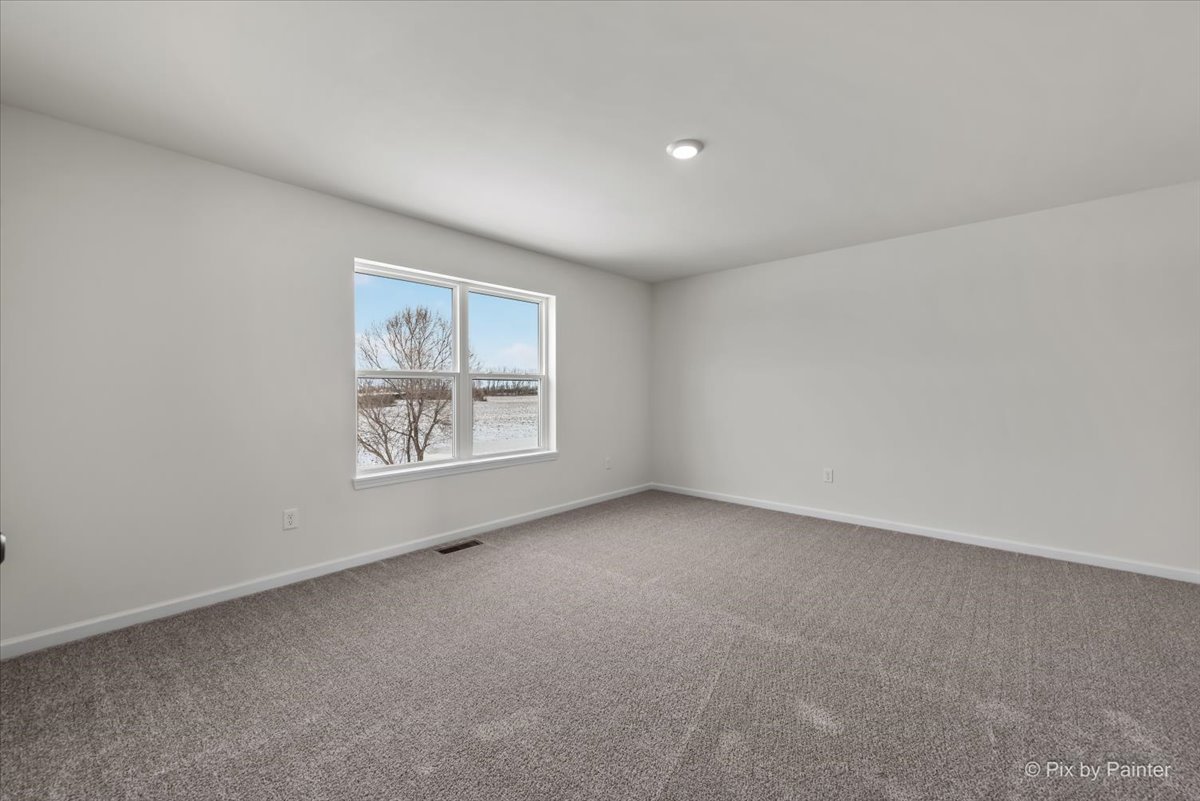 611 Apple Valley Road Harvard, IL 60033 - Photo 19 of 29 a view of an empty room with a window