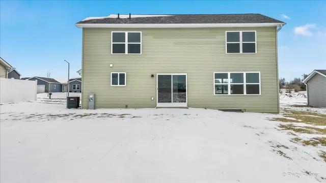 a very nice looking house with a yard