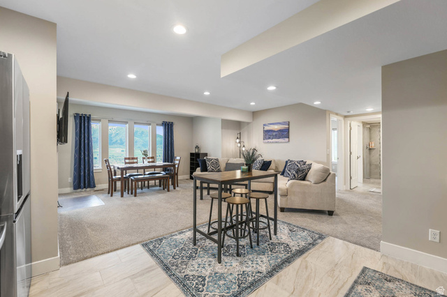 4527 North Seven Bridges Road Eden, UT 84310 - Photo 32 of 65 Dining room featuring light carpet and recessed lighting