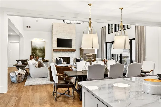 a bathroom with a toilet a sink and a mirror