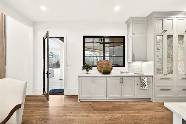 a large bathroom with a large tub and sink