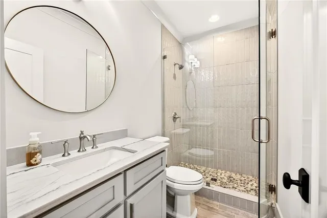 a white bath tub sitting next to a window