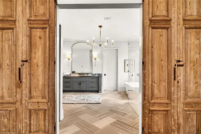 a bathroom with a tub sink and shower