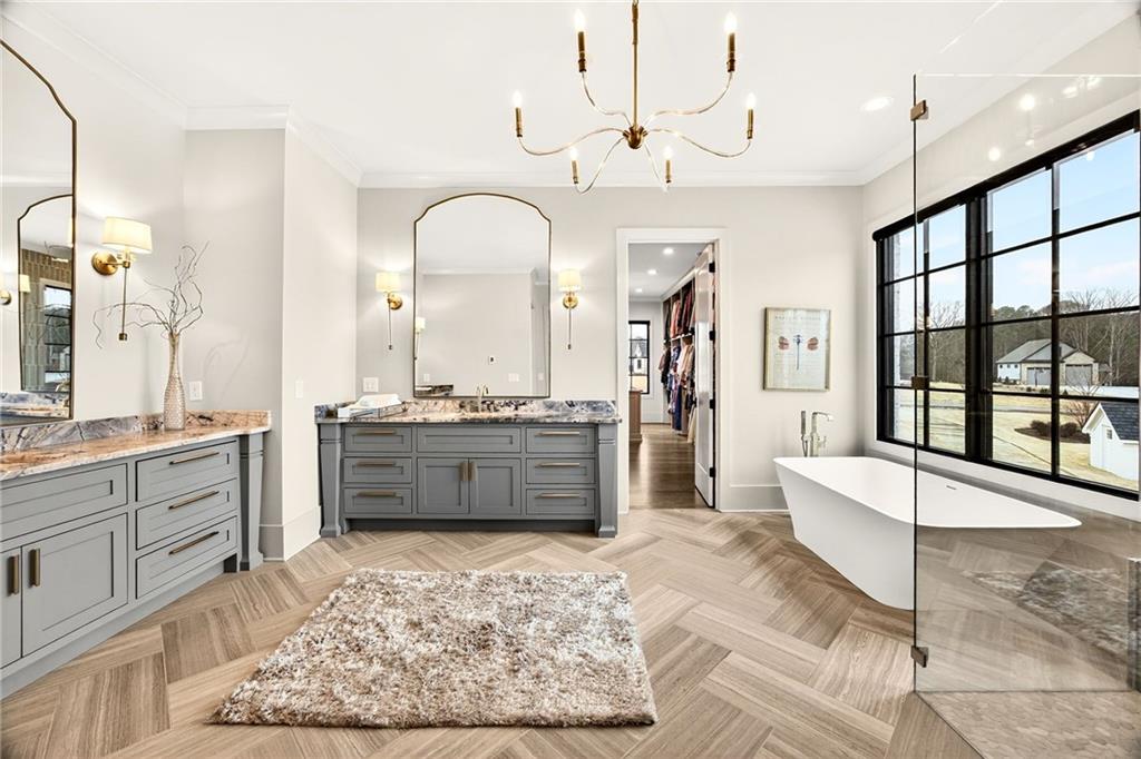 150 Fortress Way Jefferson, GA 30549 - Photo 26 of 83 a large bathroom with a large tub and sink